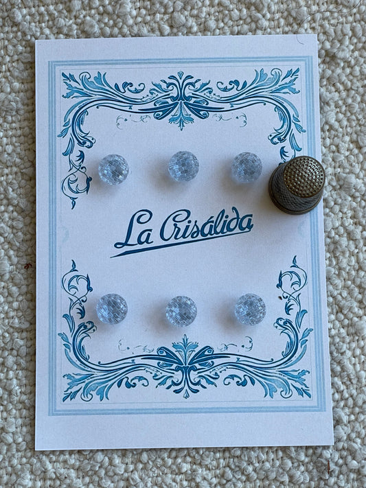 Cartón con 6 botones de vidrio color azul claro
