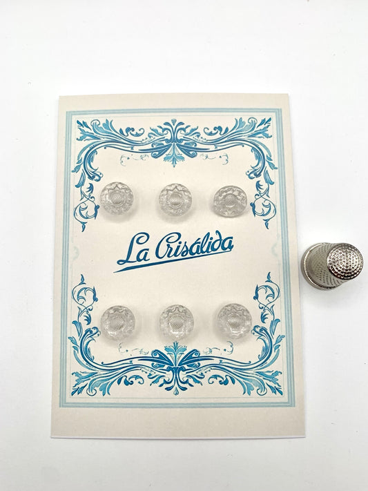 Cartón con 6 botones de vidrio con forma de flor, años 40, transparentes