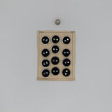 Cartón 12 botones vintage de pasta color negro y plara modelo azafata