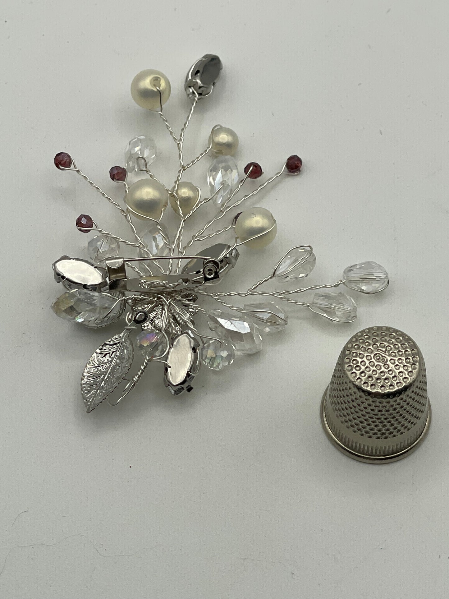 Broche con forma de ramo de flores