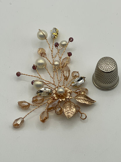 Broche con forma de ramo de flores