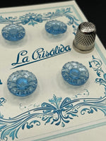 Cartón con 4 botones de vidrio con forma de flor, años 40, color azul