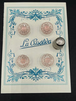 Cartón con 4 botones de vidrio antiguos color rosa claro