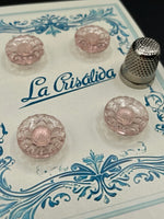 Cartón con 4 botones de vidrio antiguos color rosa claro