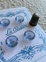 Cartón con 4 botones de vidrio años 40, color azul