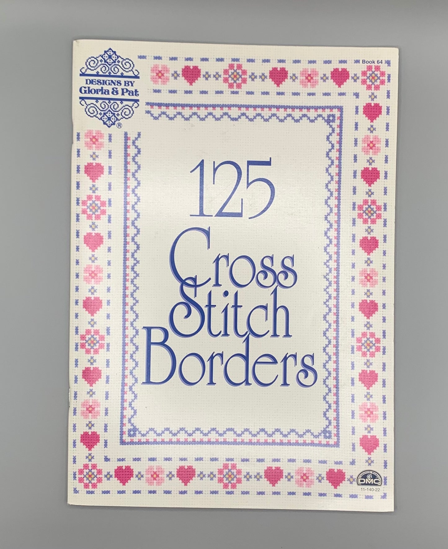 Revista "125 Cross Stitch Borders" Designs by Gloria & Pat (Idioma Inglés)