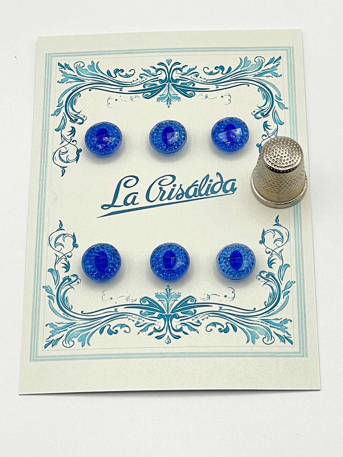 Cartón con 6 botones de vidrio, años 40, color azul intenso