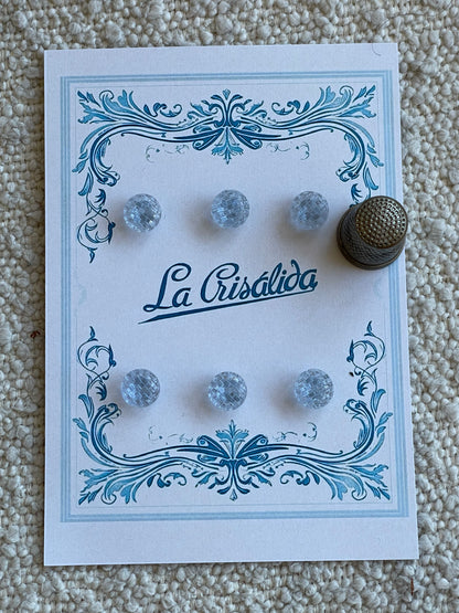 Cartón con 6 botones de vidrio color azul claro