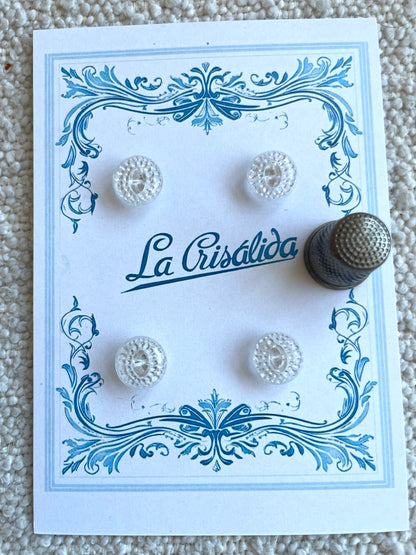 Cartón con 4 botones de vidrio, años 40, transparentes