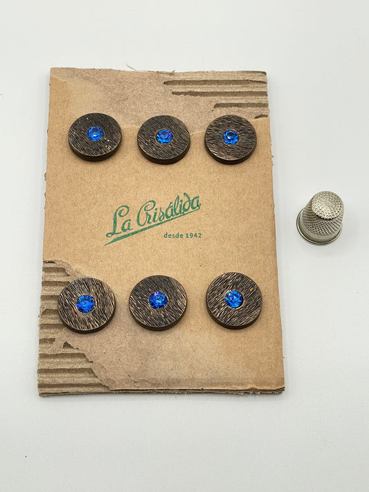 Cartón con 6 botones vintage de metal y strass color bronce y azul . Edición especial 84 aniversario La Crisálida