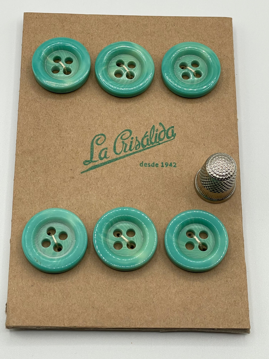 Cartón con 6 botones vintage de pasta color celeste. Edición especial 84 aniversario La Crisálida