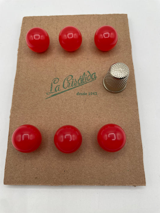 Cartón con 6 botones vintage esféricos de pasta color rojo. Edición especial 84 aniversario La Crisálida