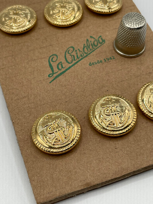 Cartón con 6 botones vintage de pasta color dorado con ancla. Edición especial 84 aniversario La Crisálida