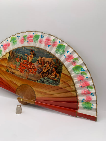Abanico de madera color rojo e imagen impresa de bailaores de flamenco doble cara