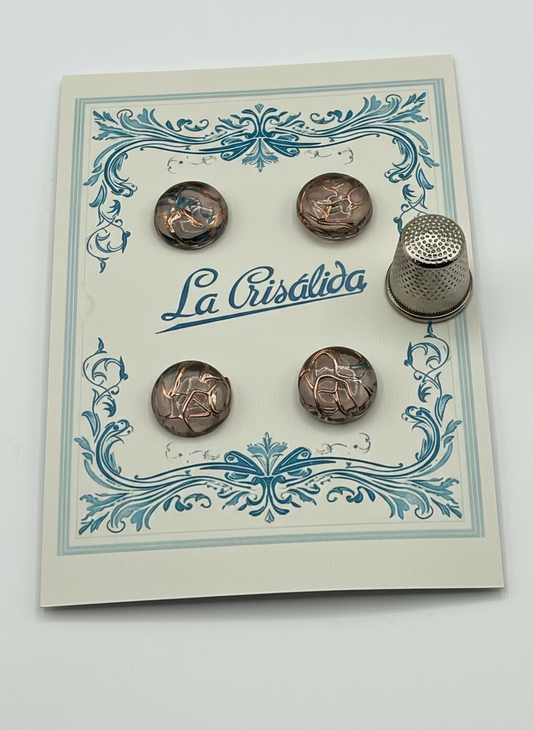 Cartón con 4 botones de vidrio años 40, color rosa palo con reflejos dorados y azules