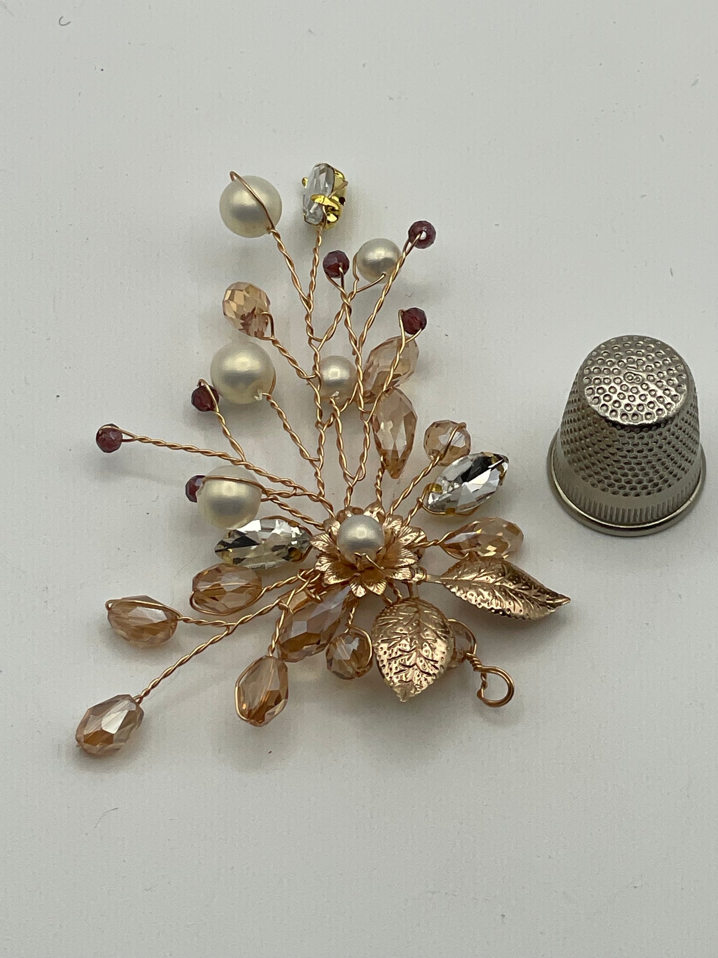 Broche con forma de ramo de flores