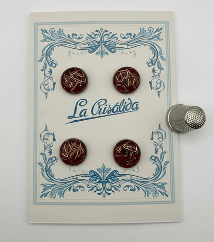 Cartón con 4 botones de vidrio, años 40, color miel con reflejos cobre