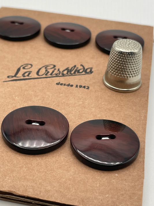 Cartón con 6 botones vintage de pasta en color madera oscura. Edición especial 84 aniversario La Crisálida