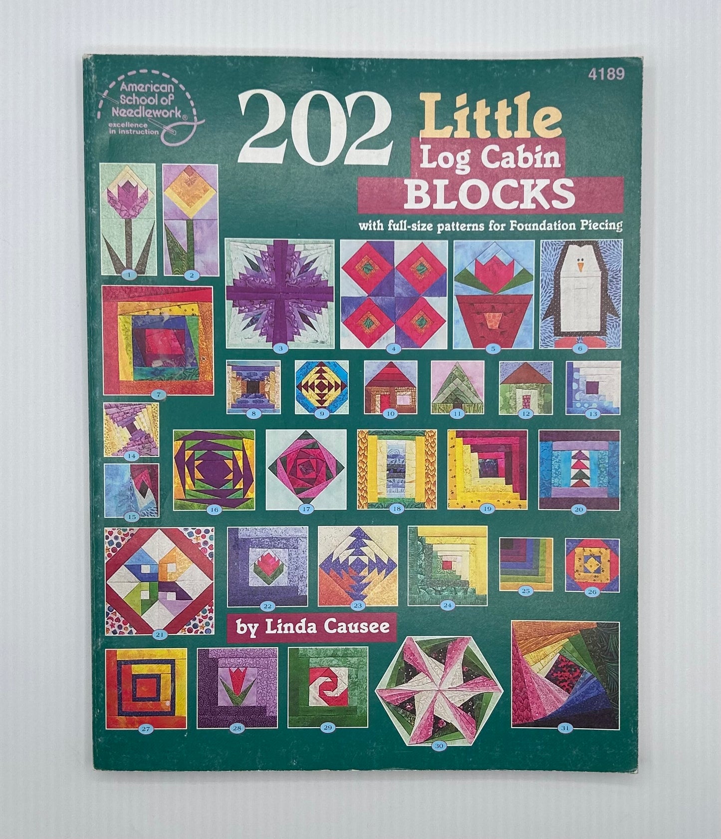 Revista "202 little log cabin blocks" By Linda Causee - 1999 (Idioma inglés)