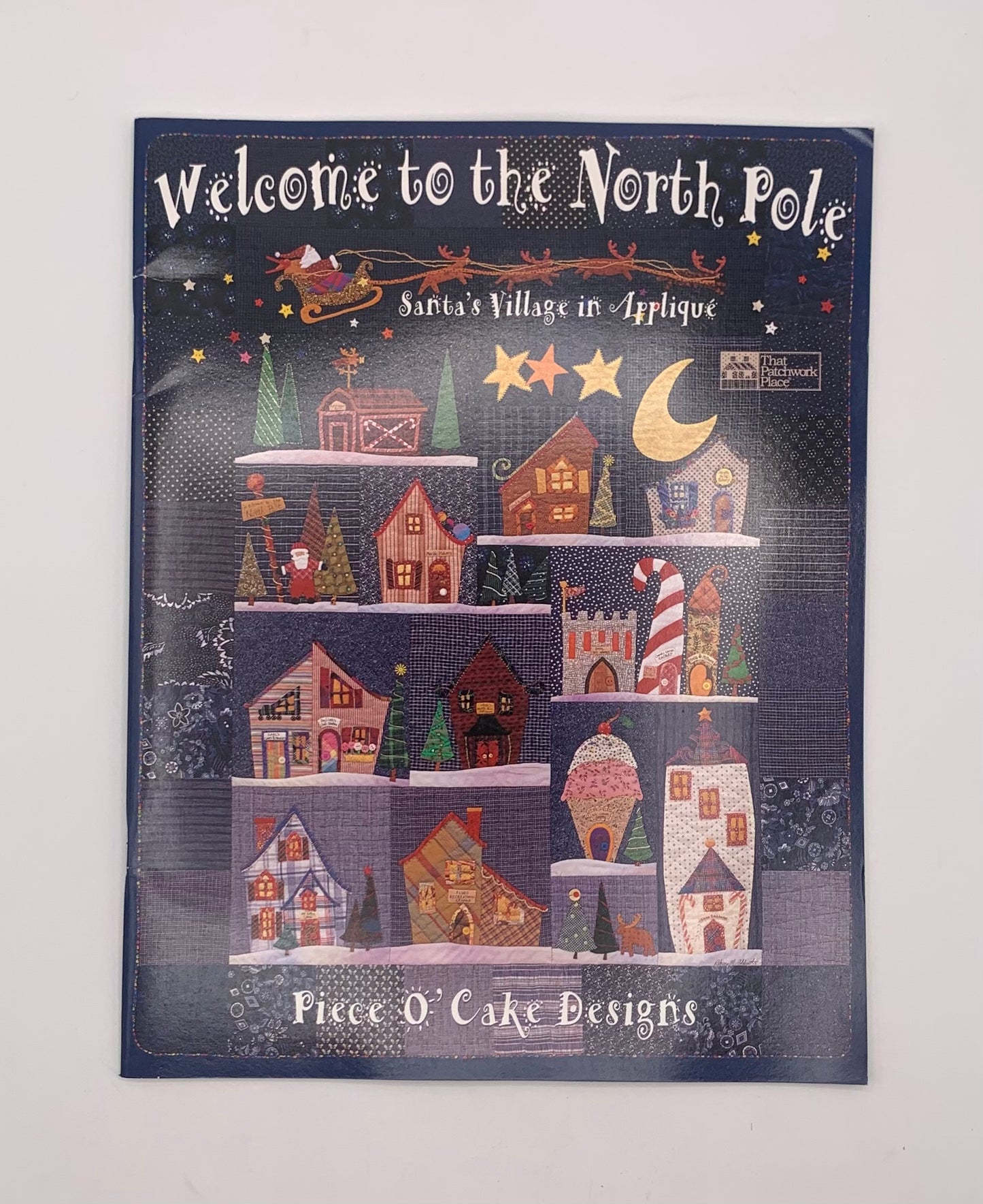 Revista "Welcome to the North Pole" Santa's village in appliqué / Piece O' Cake Designs (Patchwork) (Idioma inglés)